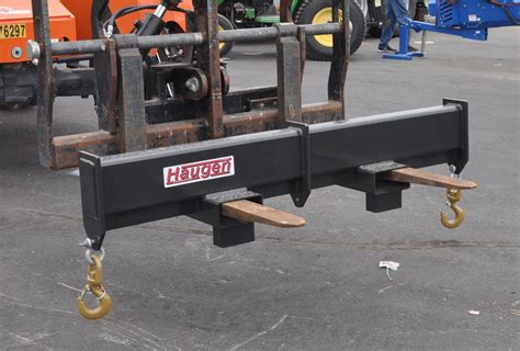 skid steer fork spreader|fork mounted spreader beam.